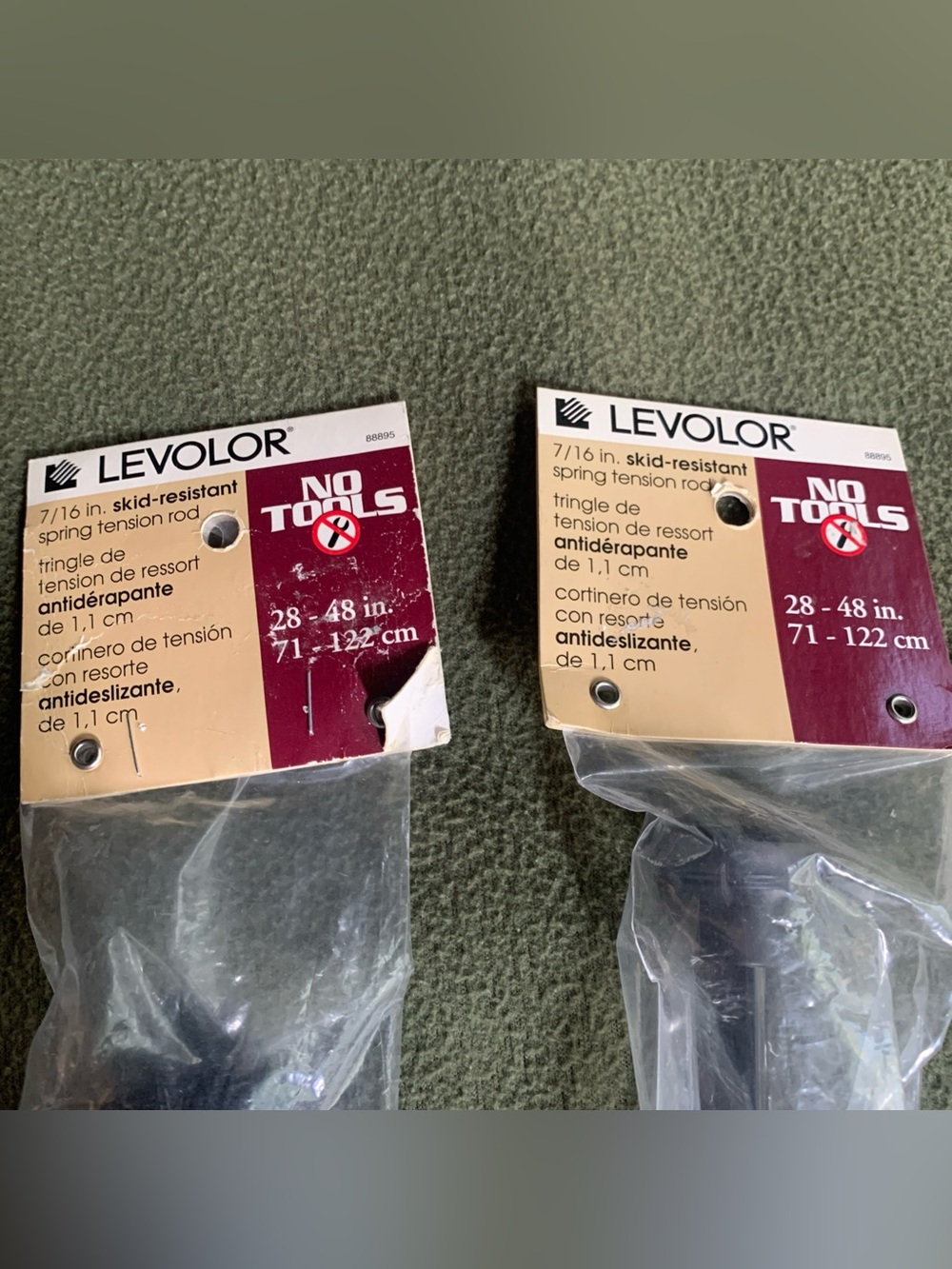 New Levolor 7/16” skid-resistant spring tension rods. 28”-48”. Black. Set of 2.